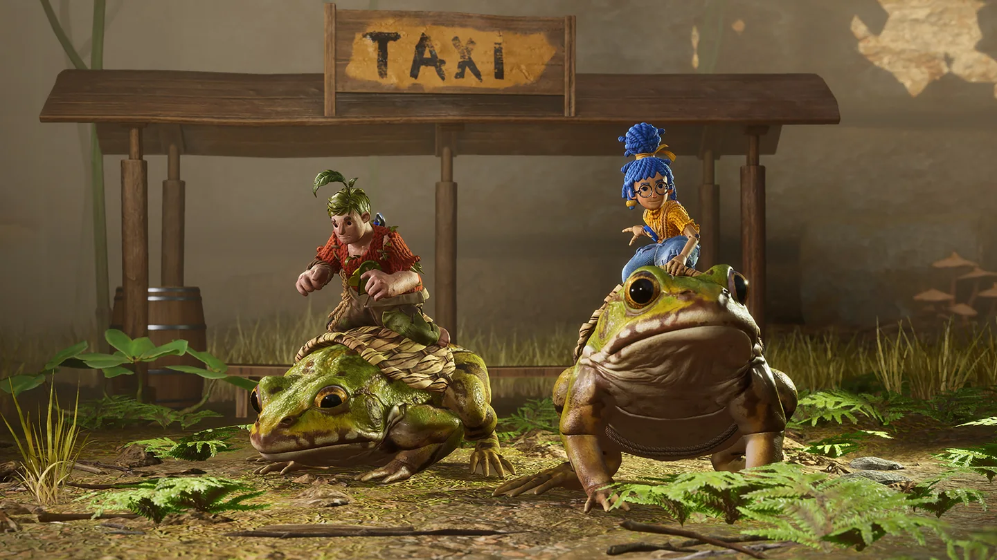 Cody and May share a playful frog-riding moment in It Takes Two